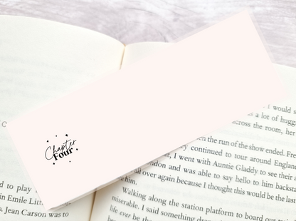Back of bookmark with shop logo "Chapter Four" text
