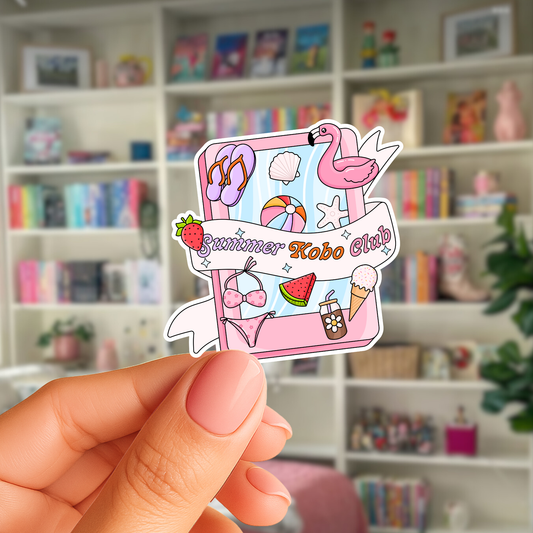 Hand holding a colorful sticker with 'Summer Kobo Club' design in front of a bookshelf.