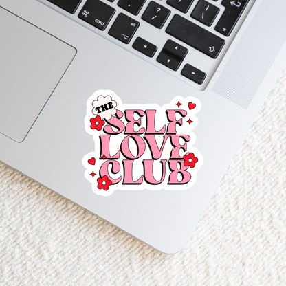 Sticker with 'The Self Love Club' text on a laptop