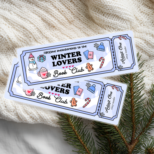 Two 'Winter Lovers Book Club' bookmarks on a textured fabric background with Christmas elements.